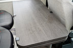 Table spacer for swivel tables in motorhomes